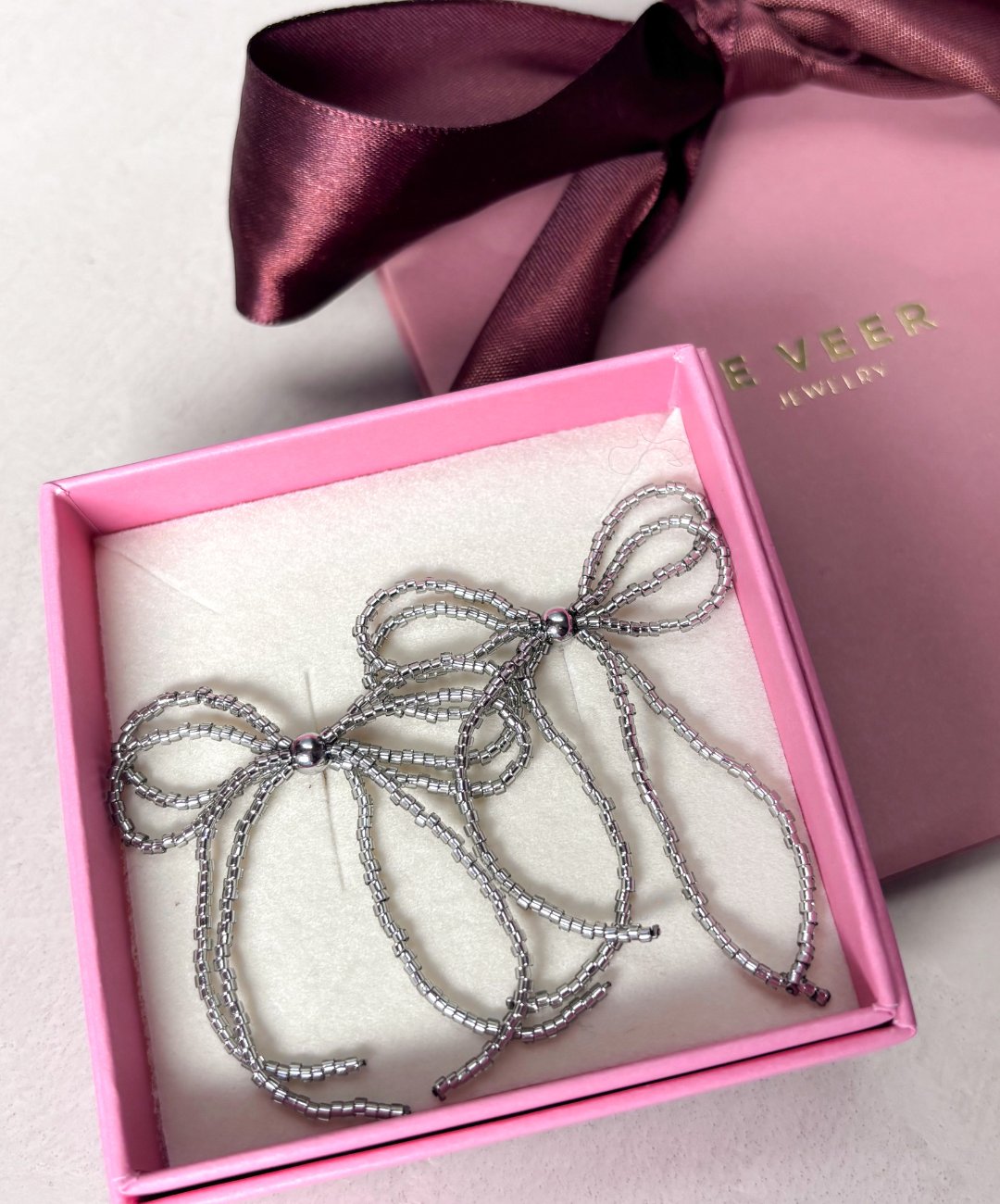 Bows of Joy Earrings Silver