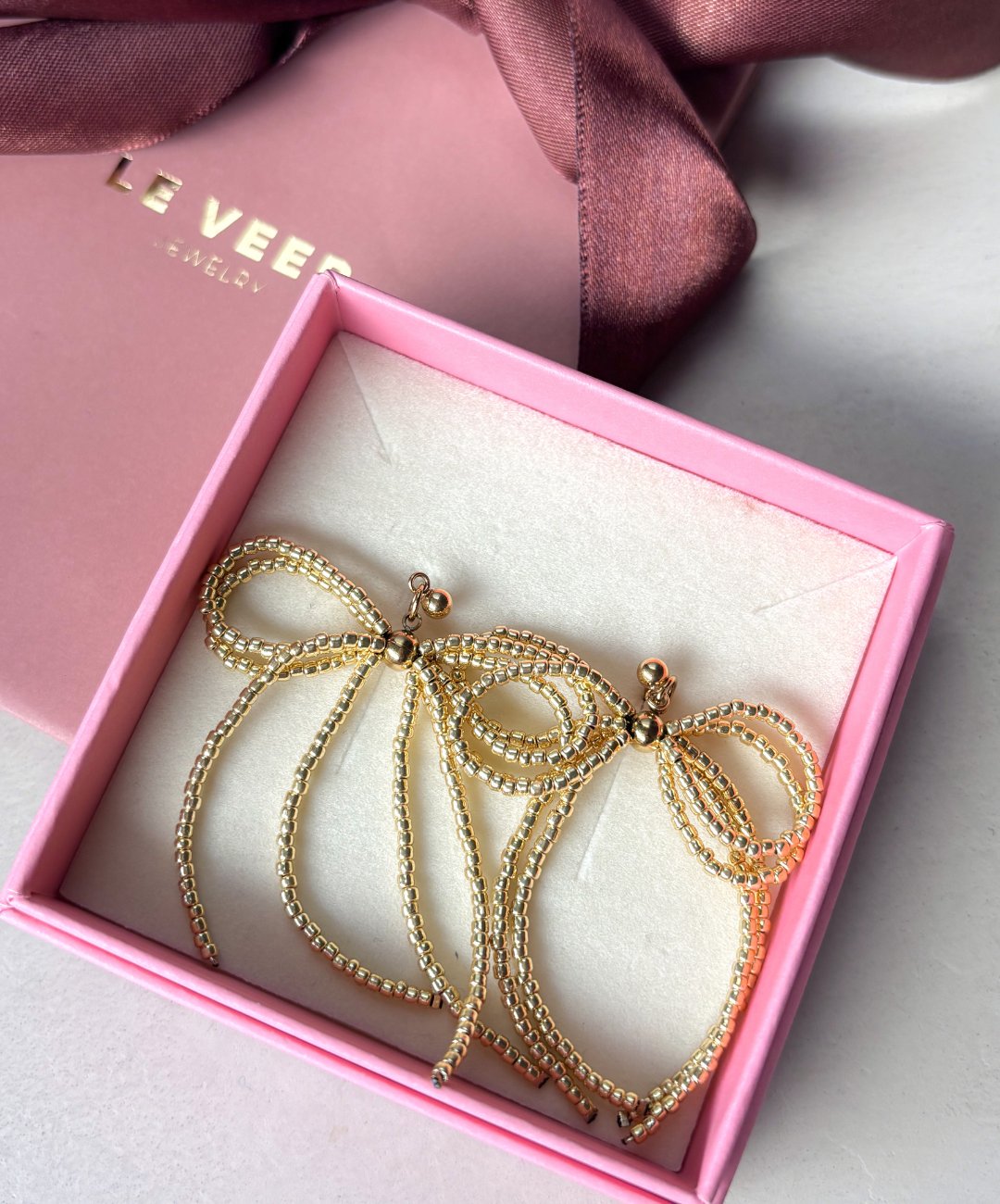 Bows of Joy Earrings Gold