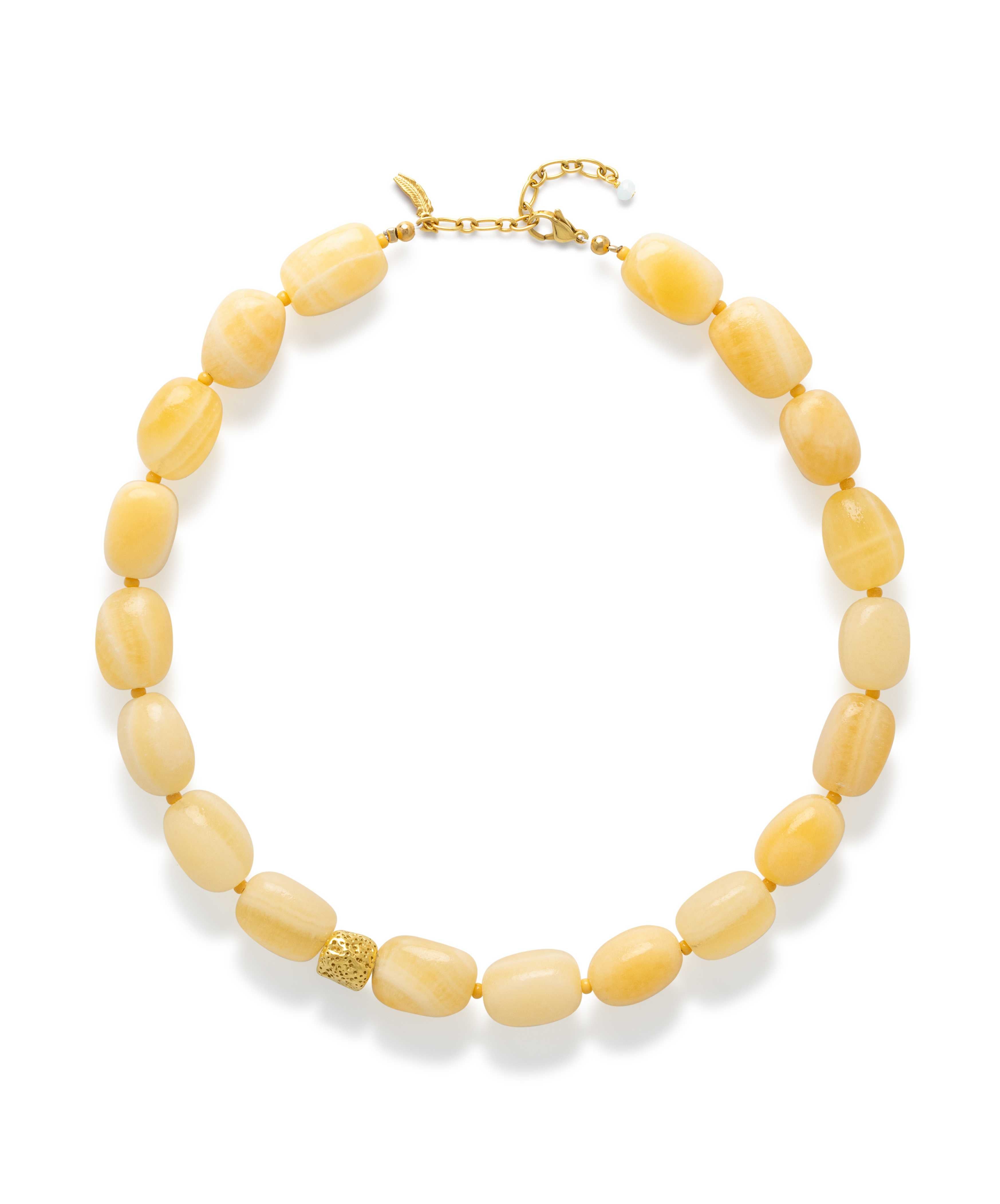 Handgemaakte statement ketting met gele calciet kralen in zachte geeltinten met stainless steel sluiting.